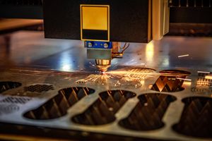 A laser cutting machine precisely cutting metal material.